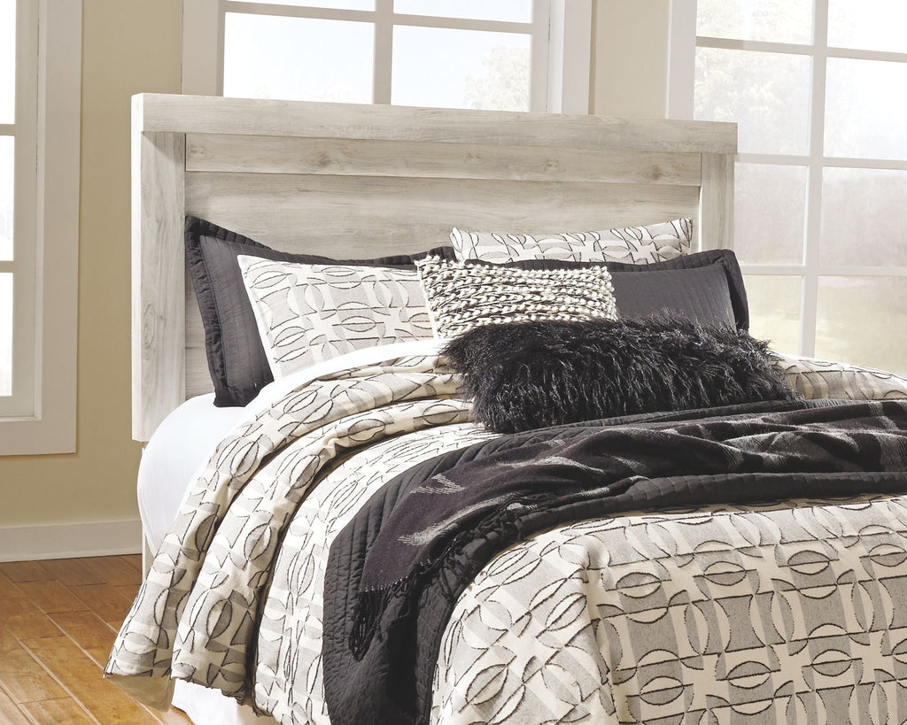 Lit plateforme blanchi avec rangement