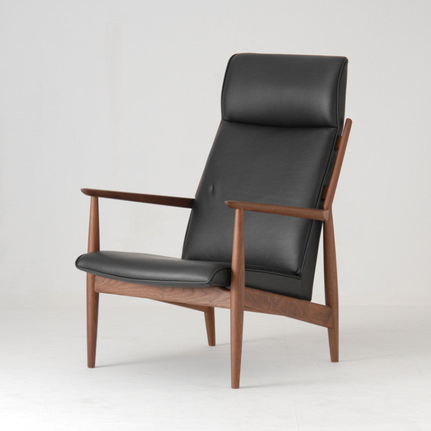Fauteuil en tissu et cuir