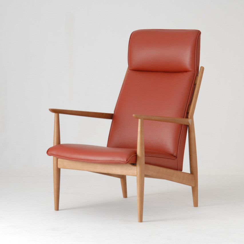 Fauteuil en tissu et cuir